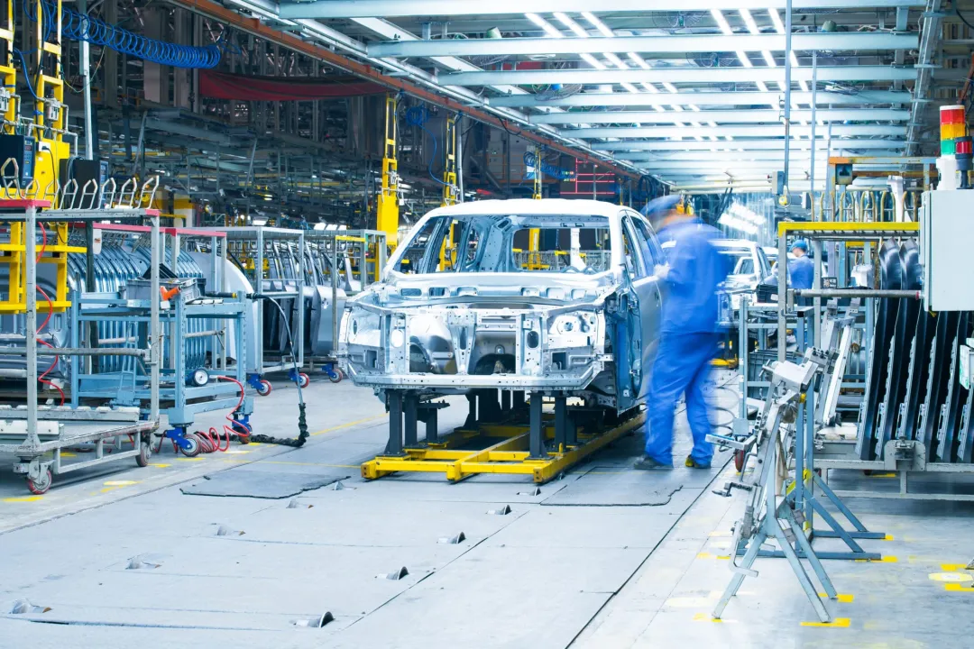 Worker on an automotive assembly line