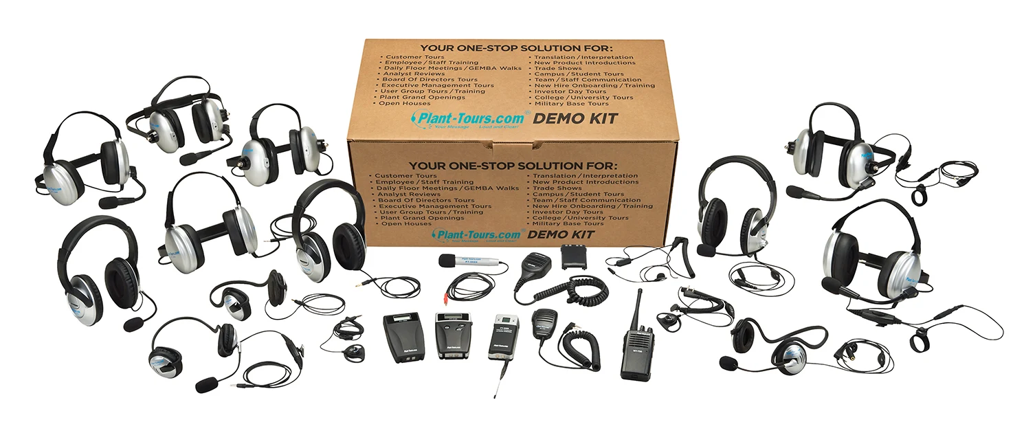 Plant-Tours.com demo kit box surrounded by headsets, earpieces, receivers and transmitters